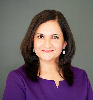 young dark-haired woman in a purple dress