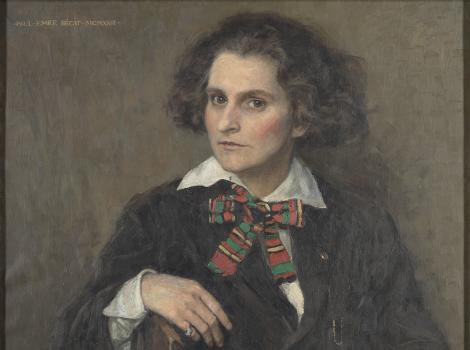 Waist length portrait of a woman wearing a plaid bowtie