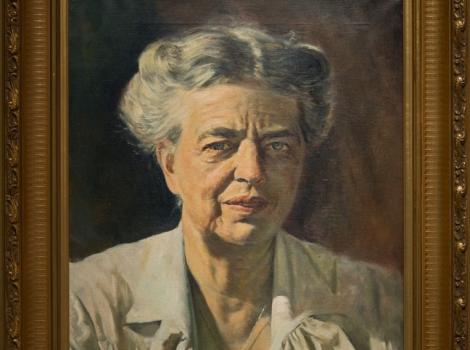 A painting of a woman with gray hear looking at the viewer