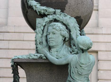 Daguerre monument -- bronze bust of Daguerre with large stone globe on top,