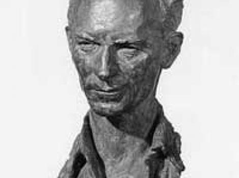 Black and white picture of bronze bust of Ernie Pyle