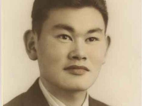 Colorized photograph portrait of Fred Korematsu in suit