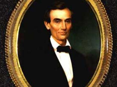 Painted portrait of Abraham Lincoln in circular gold frame
