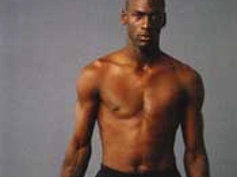 Michael Jordan shirtless, holding basketball