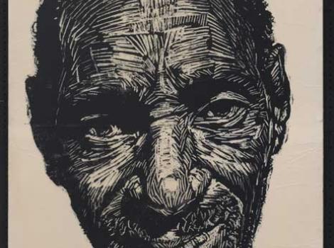 Large oversized portrait of man's face looking straight ahead