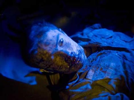 Portrait of a wounded soldier, titled "Night Raid" by Louie Palu