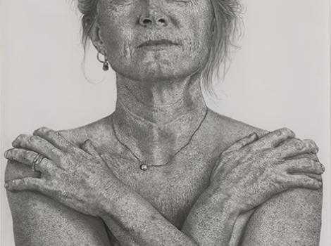 Charcoal drawing of a woman from the waist with her arms crossed over her chest, from front.