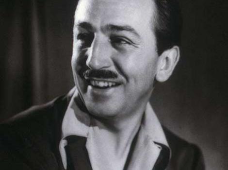 Black and white photo of Walt Disney smiling