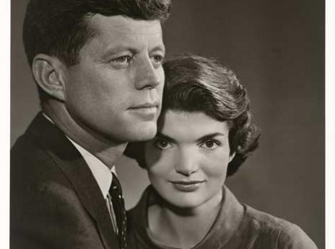 Black and white photograph of John and Jacqueline Kennedy with neutral background