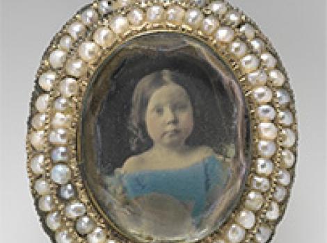 Pin with portrait of a young girl