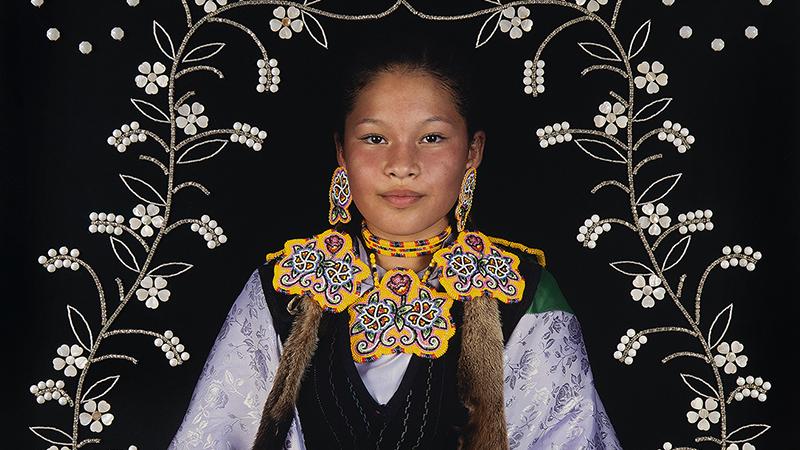 Native American woman in colorful dress