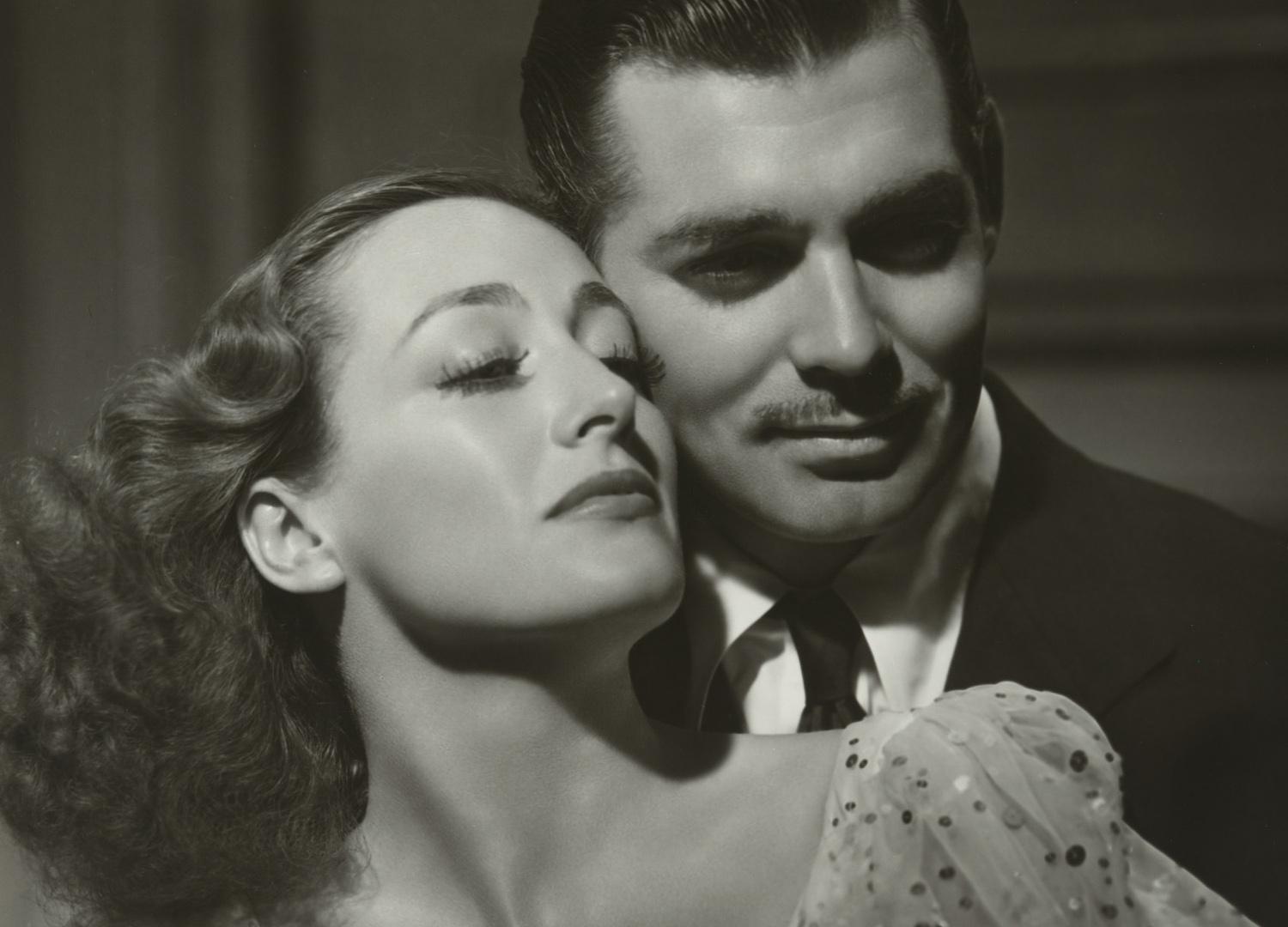 black and white headshot photo of a man and woman