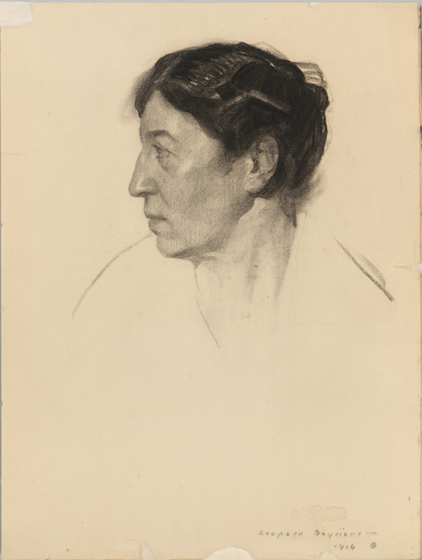 profile portrait of a woman with upswept hair